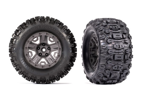 Tires & wheels, assembled, glued (charcoal gray 2.8" wheels, Sledgehammer® tires, foam inserts) (2) (TSM® rated)